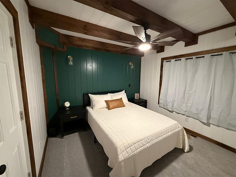 Chapter's End Freestanding bathtub with bath soaps and toiletries